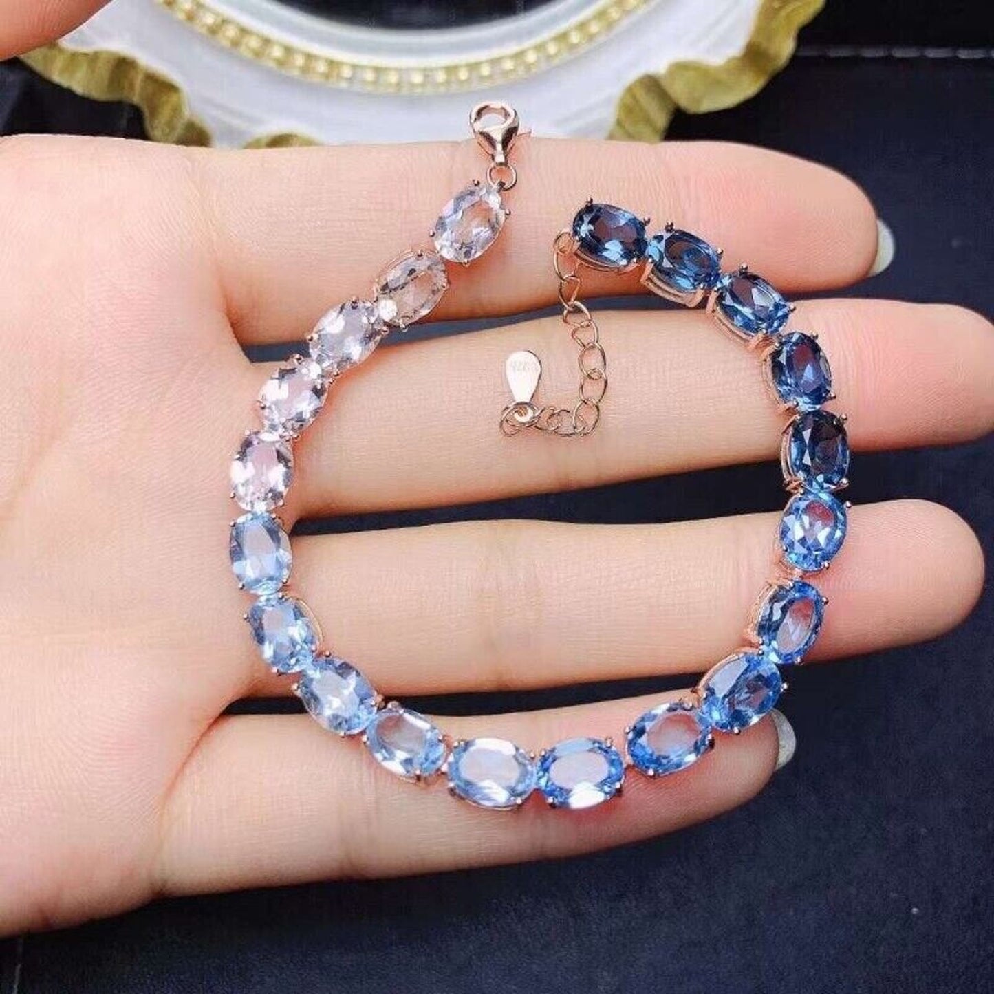 Gradient Blue Topaz Tennis Bracelet 6x8mm Sterling Silver