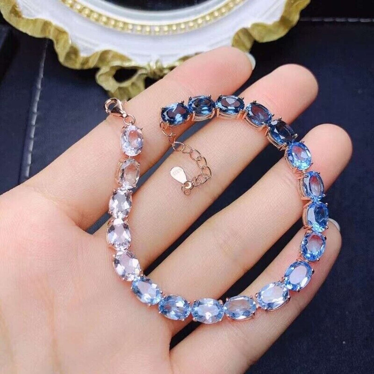 Gradient Blue Topaz Tennis Bracelet 6x8mm Sterling Silver